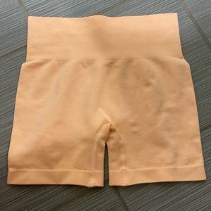 Peach workout shorts